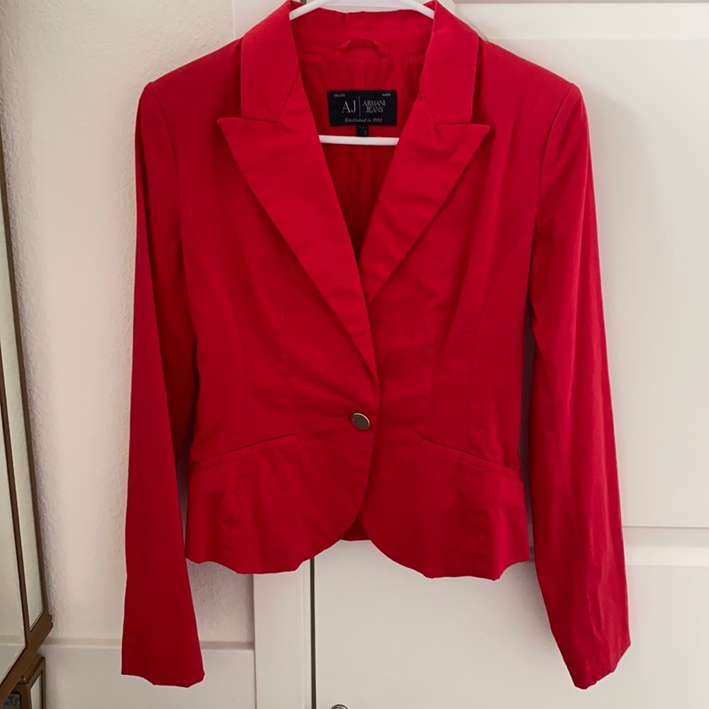 Fitted jacket. Flattering figure. Almost new
